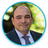 Chris Paszyc a man in a suit 